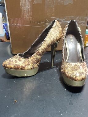 Dereon Gold Leopard-Print Platform Pumps.  These Shoes Are Used Bu Look Great.